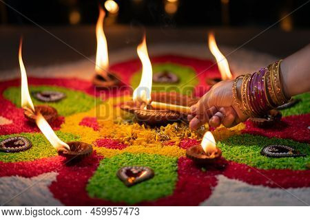 Traditional Diya Lamps Lit During Diwali Celebration