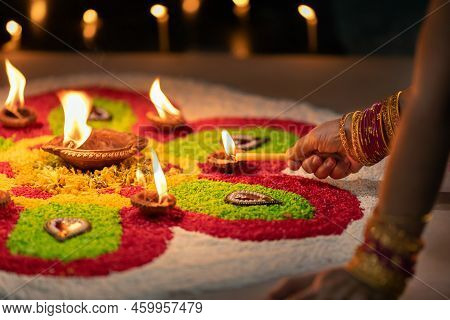Traditional Diya Lamps Lit During Diwali Celebration