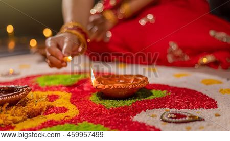 Traditional Diya Lamps Lit During Diwali Celebration