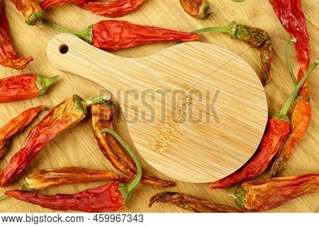 Dry Organic Red Round Chillies Top View Background. Healthy Spices. Close Up. Copy Space
