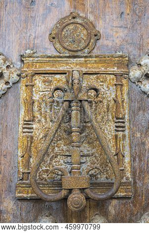 Old, Rusty Metal Knocker On A Church Door