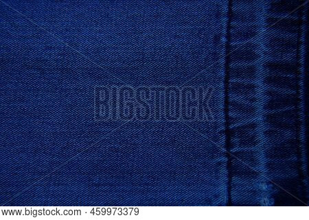 Pleats In Denim Cotton Surface. Abstract Background.