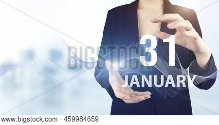 January 31st . Day 31 Of Month, Calendar Date. Hand Hold Virtual Hologram Calendar Date With Digital