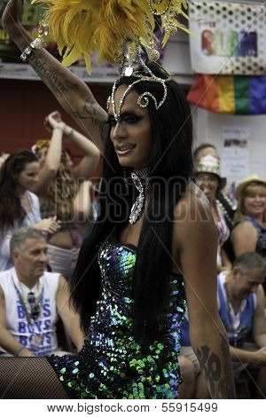 Female impersonator riding in Provincetown Carnival Parade