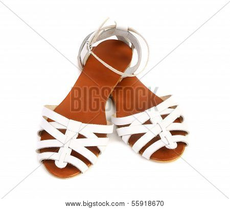 Pair of white leather female sandals