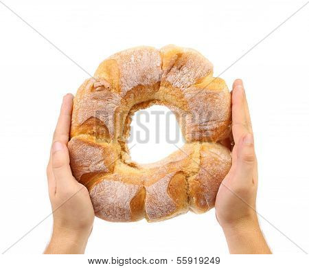 Hands holds white kalatch.