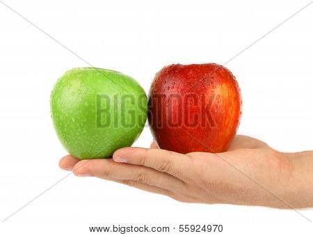 Hand mit grÃ¼nen und roten Ã„pfeln