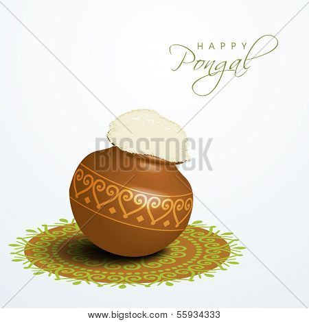 Happy Pongal, harvest festival celebration in South India with pongal rice in a traditional mud pot on beautiful floral (rangoli) decorated background. 