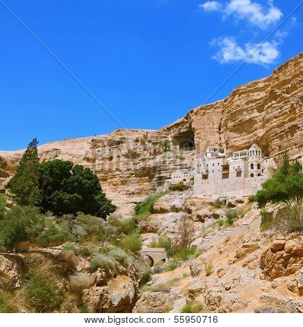 The famous Orthodox monastery of St. George. The building of the monastery was built on the wall of the gorge of Wadi Kelt. Israel