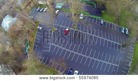 Cars on parking at rainy day. View from unmanned quadrocopter