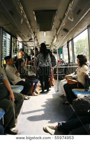 People going by bus