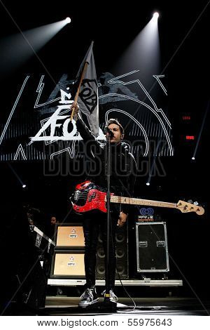 BOSTON-DEC 14: Bassist Pete Wentz of Fall Out Boy performs at KISS 108's Jingle Ball 2013 at TD Garden on December 14, 2013 in Boston.