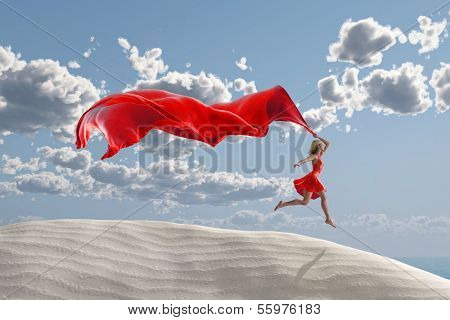 woman running with a red tissue 