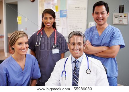 Portrait Of Medical Team At Nurses Station