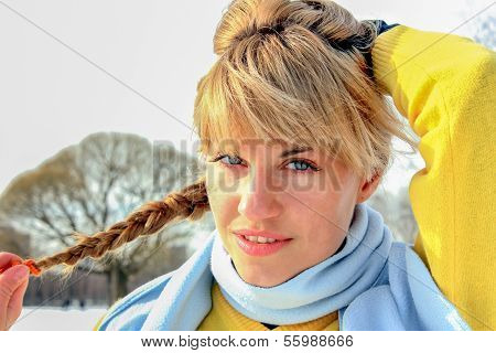 Portrait of young woman outdoors