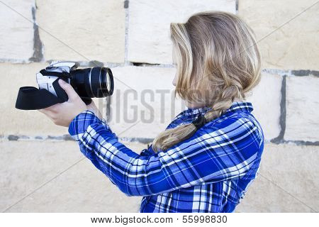 Cool Kid Holding A Camera Taking A Photo Of Herself