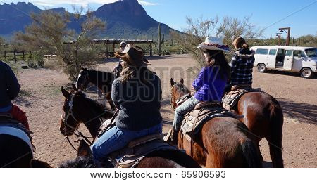 Arizona, Usa - February 04, 2014: Visitors Ride On The Hourse Back At Arizona, Usa. Horseback Riding