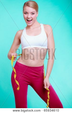 Diet. Fitness Woman Fit Girl With Measure Tape Measuring Her Waist