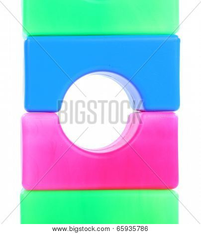 Plastic colorful blocs isolated on white