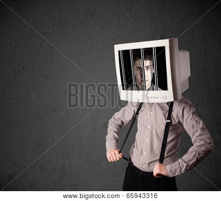 Business man with monitor screen on his head traped into a digital system concept