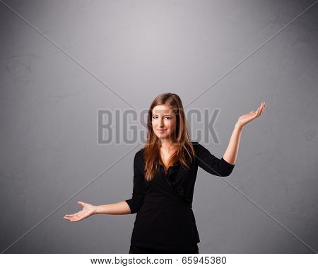 beautiful young lady standing and juggling with copy space