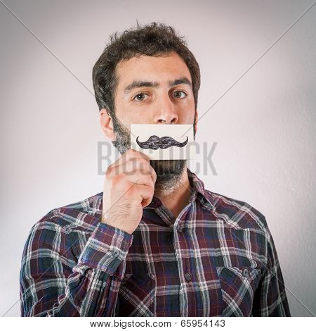man with fake paper moustaches