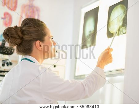 Medical Doctor Woman Fluorography. Rear View