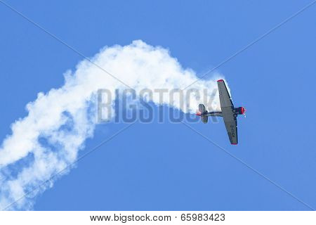 BERLIN, GERMANY - MAY 20, 2014: The aircraft Red Bull Noorduyn AT-16 D-FHGK demonstration during the International Aerospace Exhibition ILA Berlin Air Show-2014.