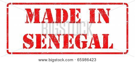 Made in Senegal - inscription on Red Rubber Stamp.