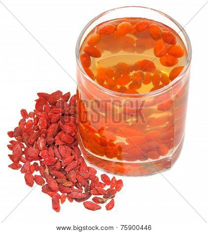 Glass With Goji Berries Infusion And Dried Fruits