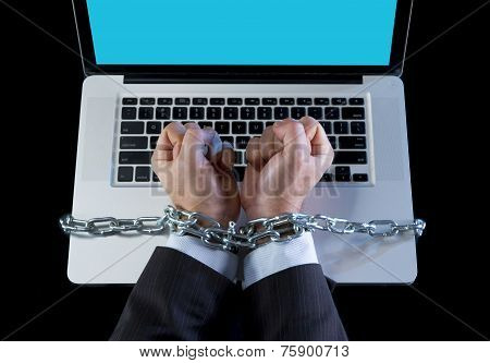Hands Of Businessman Addicted To Work Bond With Chain To Computer Laptop In Workaholic