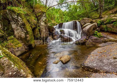 Waterfall during the autumn near the Queimadela Dam in the Municipality of Fafe. Portugal