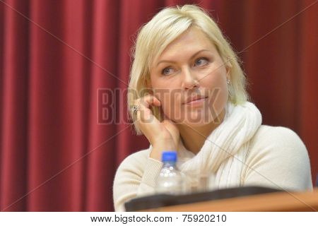 NOVOSIBIRSK, RUSSIA - NOVEMBER 8, 2014: World champion in boxing Natalia Ragozina talk with children. The meeting dedicated to the Friendship Cup and aimed to promote the sport