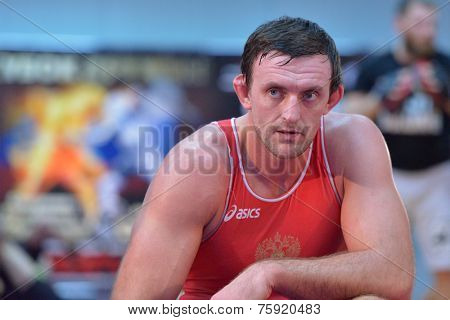 NOVOSIBIRSK, RUSSIA - OCTOBER 16, 2014: Greco-Roman wrestling World Cup winner Vasily Teploukhov on the open training. The event aimed to promote the MMA Friendship Cup which took place on November 8