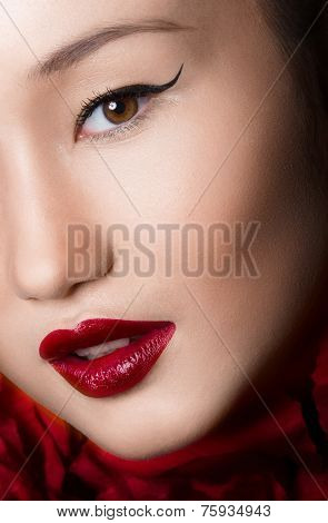 Asian Woman Close up With glamour make up and red lips