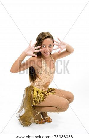 Teenger smiling in golden dress