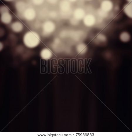 Abstract Festive Background. Glitter Vintage Lights Background With Gold And Black Lights, Defocused