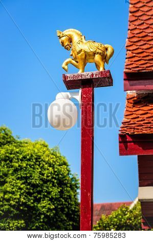 A golden horse lamp