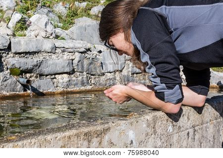 Young Girl Drinking Water