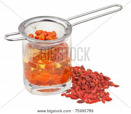 Strainer In Goji Berries Tincture And Dried Fruits