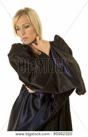 Woman In Black Cloak Hand By Neck Look Side