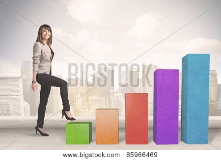 Business person climbing up on colourful chart pillars concept on city background