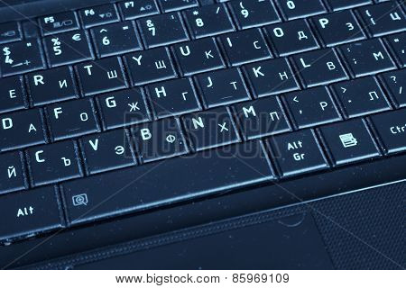 Dirty Laptop Keyboard In Blue Tones