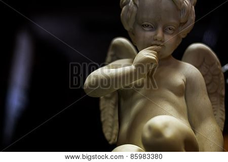 Sculpture of a boy angel