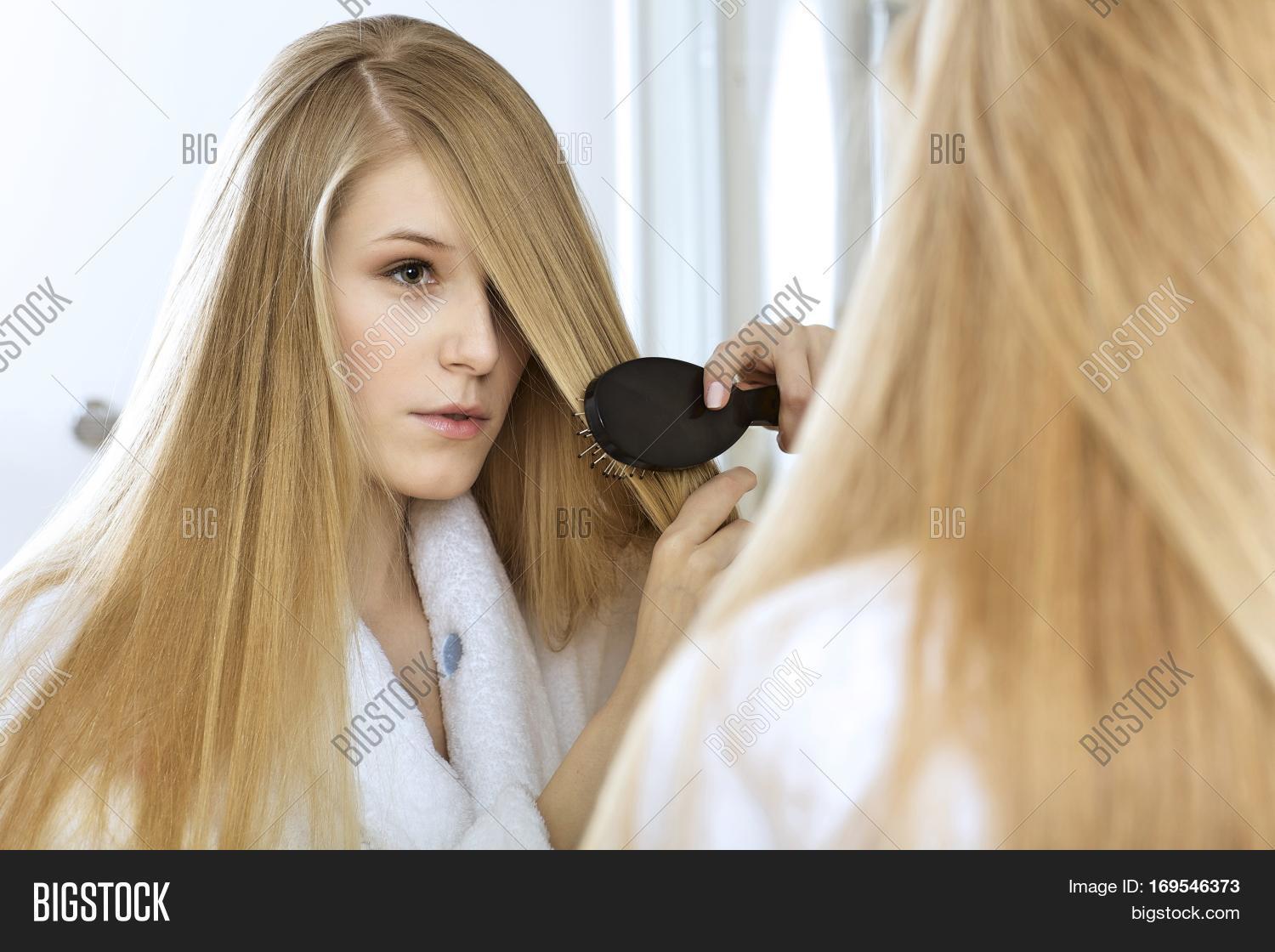 Woman Brushing Hair Image & Photo (Free Trial) Bigstock