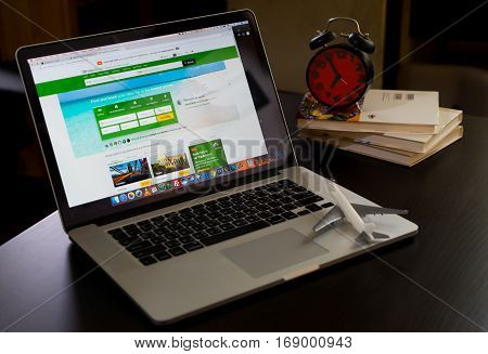 Bangkok, Thailand - December 14, 2016: Business man is using tripadvisor application to plan his trip.