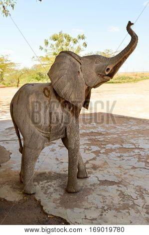 Wooden elephant at the entrance of a shop in Tsavo park in Kenya