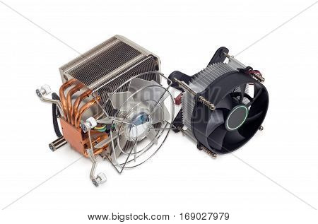 One active CPU cooler with large finned heatsink fan copper thermal pad with heat pipes one cooler with fan and aluminum finned heatsink on a light background