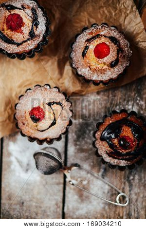 Delicious Chocolate Cupcakes With Berries On Wodeen Table, Top V