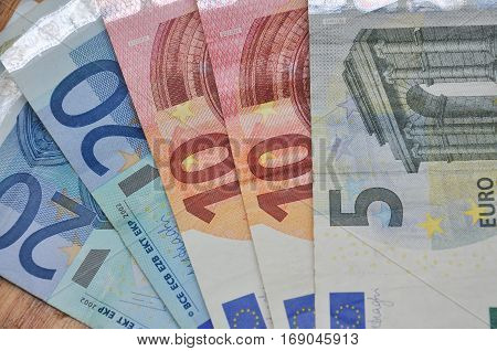 US dollar and EURO banknotes, small paper money